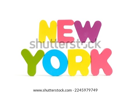 Names city New York are laid out multicolored letters white background