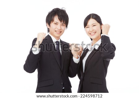 smiling businesswoman and businessman
