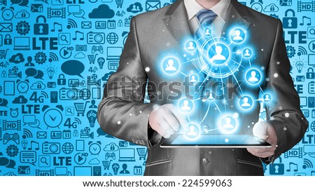 Business man using tablet PC social connection