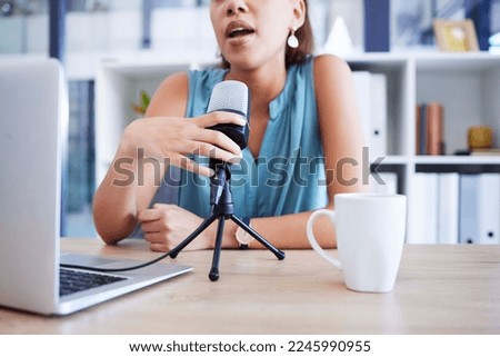 Microphone, influencer and radio with a woman presenter using a laptop to live broadcast while streaming in her home office. Podcast, news and network with a female freelance worker sitting at a desk