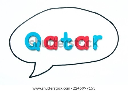 Alphabet letter with word qatar in black line hand drawing as bubble speech on white board background