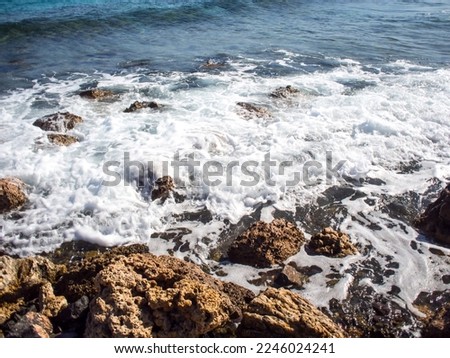 Sea view scenery, rocks and splash of waves