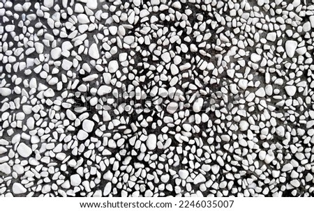 Road gravel, crushed stone. Gravel texture. Crack stones at a construction site. Seamless texture of white stones or gravel