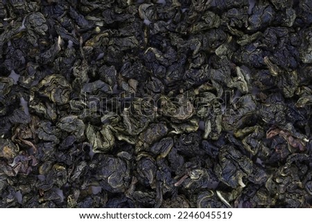 Organic Oolong tea. Top view. Close up. High resolution stock images. Oolong green tea leaves. texture. top view