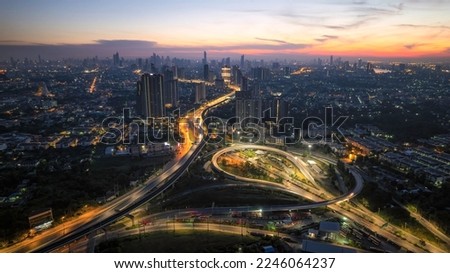 Cityscape sunrise from bird eye view with dramatic cloud