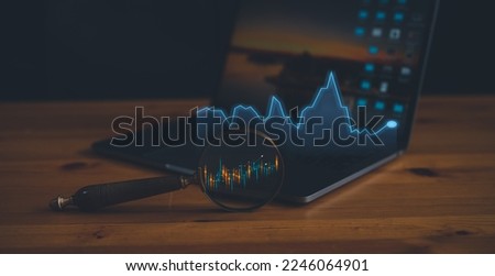 man use magnifying glass and computer laptop on wooden table searching for best option to investment in stock market or mutual funds, sale deal, Data Search, information, stock market, trading graph, 
