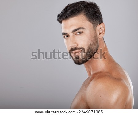 Man, studio portrait and skincare with beauty, cosmetics and wellness by studio backdrop with natural glow. Model, self care and healthy aesthetic for cosmetic self love, body care and radiant facial Royalty-Free Stock Photo #2246071985
