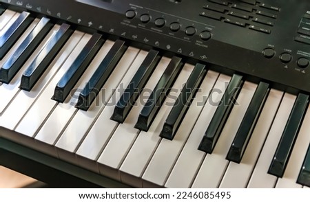 Black and white synthesizer keys close-up