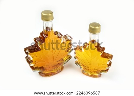 Maple syrup bottles on a white background.  