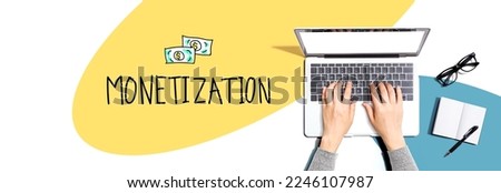 Monetization with person using a laptop computer