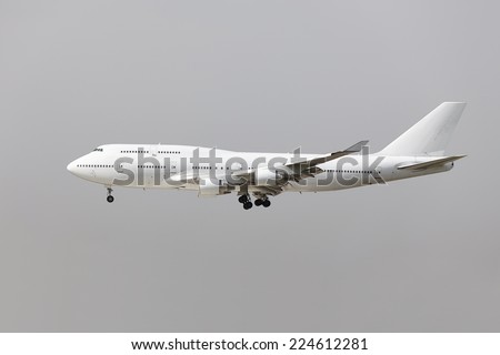 Landing of a commercial airliner Royalty-Free Stock Photo #224612281