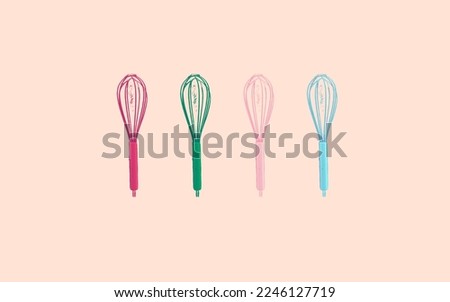 colored steel whisk,background top view