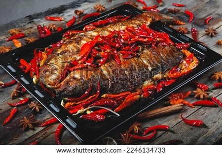Grilled fish pictures capture the essence of grilled fish, from the rich aromas of the grill, to the perfectly caramelized and flaky textures, to the colorful sides and accompaniments. 