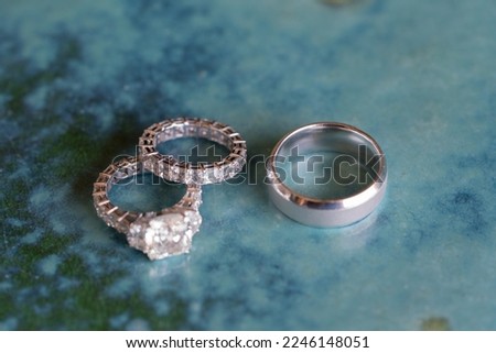 wedding ring on blue table background