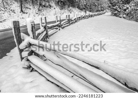A late-winter storm hit the Great Smoky Mountains National Park with one last blanket of snow one March morning, covering this aged wooden fence in several inches of the white stuff.