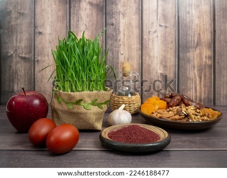 A festive table in honor of Navruz. Wheat, dried fruits, nuts, dyed eggs, sumac, garlic and vinegar. The traditional holiday of the vernal equinox Navruz