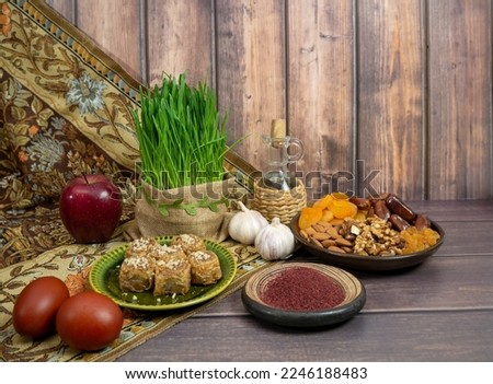 A festive table in honor of Navruz. Wheat, dried fruits, nuts, dyed eggs, sumac, garlic and vinegar. The traditional holiday of the vernal equinox Navruz