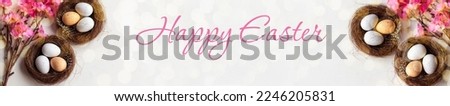 easter banner. Happy easter eggs on nest. happy easter card. The inscription on the banner Happy Easter. copy space