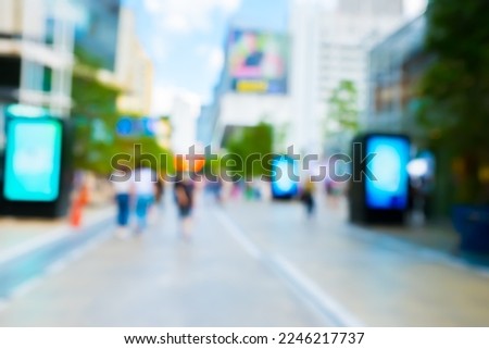 Blurred People walking in siam square ,Siam square is a Famous shopping and popular among teen.