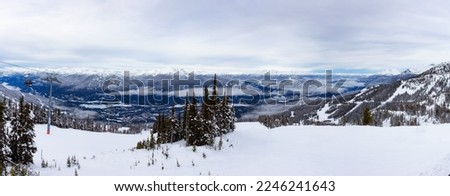 Canadian Mountain Landscape Nature Background covered in snow. Blackcomb Mountain in Whistler, British Columbia, Canada.