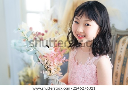 Portrait of little Asian girl in pretty dress. Memorial photography. Shichigosan.