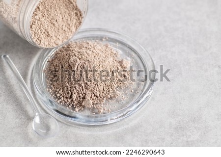 Activated zeolite,clinoptilolite activated saponite, silicon, body detoxification on a light background, macro Royalty-Free Stock Photo #2246290643