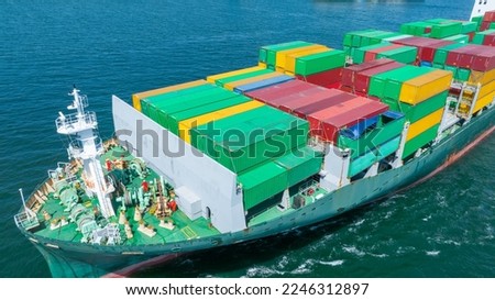 cargo container ship sea freight carrying container and running for export goods from cargo yard port to custom ocean concept technology transportation , customs clearance. logistics supply front view
