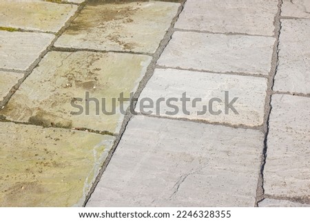 Cleaning sandstone paving. Garden patio before and after jet washing or pressure washing, UK. 