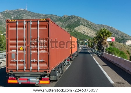 Euro-modular truck, road train or mega-truck with two 40-foot containers traveling on the highway. Royalty-Free Stock Photo #2246375059