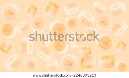 Creative levitation pattern with abananas. Selective focus. Isolated fruits. Packaging concept. Clip art image for package design.