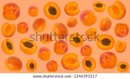 Creative levitation pattern with apricots. Selective focus. Isolated fruits. Packaging concept. Clip art image for package design.