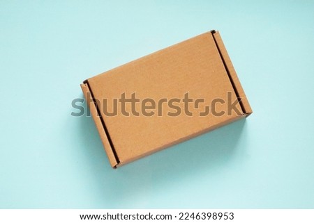 Craft Cardboard Box Container on the blue background