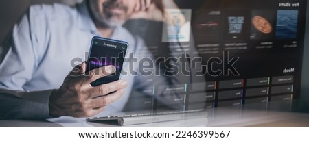 Man play music with smartphone and computer. Radio broadcast and sharing audio, streaming concept.