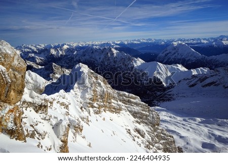 Beautiful nature view of Zugspitze peak in winter with snow capped mountains.