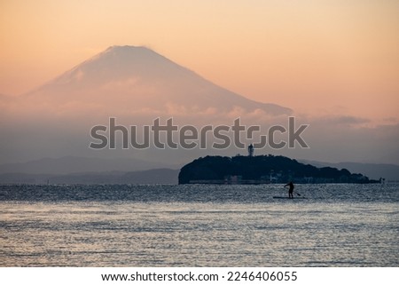 Enoshima and Mount Fuji at sunset from Zushi coast, Zushi city, Kanagawa prefecture, Japan Royalty-Free Stock Photo #2246406055
