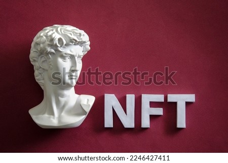 David Statue and NFT concept of digital art and cryptocurrency online for buying and selling in the metaverse as well as vaporwave style Royalty-Free Stock Photo #2246427411