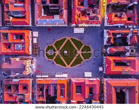Union Square aerial view with the surrounding baroque style buildings. Photo was taken on the 6th of January 2023 in Timisoara, the European Cultural Capital of 2023, Timis County, Romania. Royalty-Free Stock Photo #2246430445
