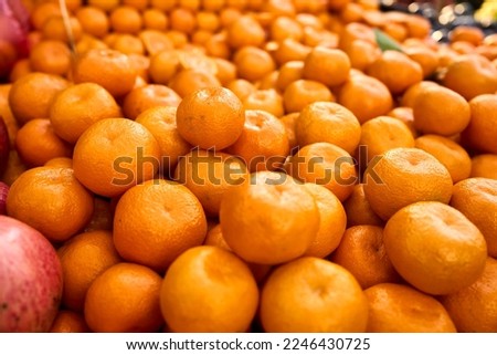 Tangerine background. Fresh mandarin on farmers market.