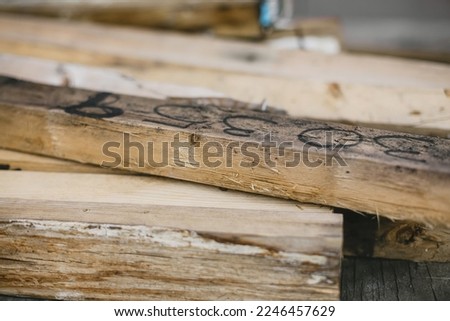 Weathered Wood Pile on Construction Site