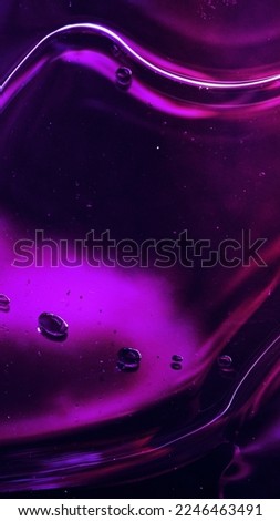 Vibrant neon purple liquid background Royalty-Free Stock Photo #2246463491