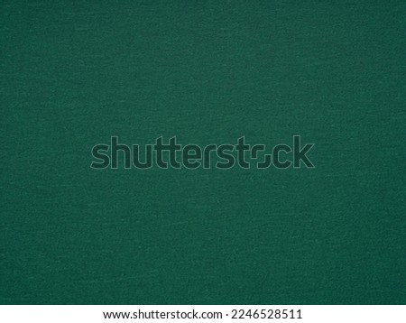Dark green paper texture. Effect for winter season Christmas festival card, new year art designs decoration, design of Christmas, New Year, Patrick Day, xmas gift card, 3d or other holiday pictures. Royalty-Free Stock Photo #2246528511