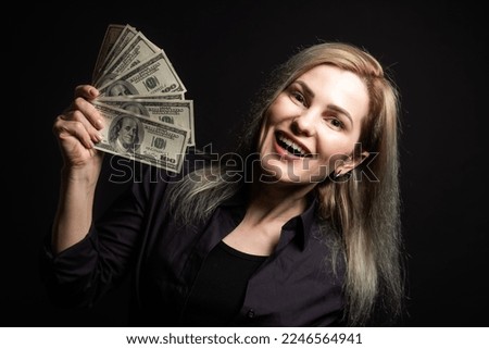 Business, finance and employment, entrepreneur and money concept. Successful young asian office manager, businesswoman showing earned cash, smiling satisfied as holding dollars.