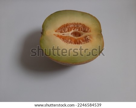 Top view fresh half cut melon on isolated white background