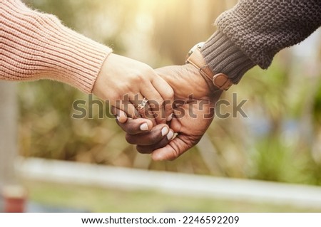 Love, support and trust hands of black couple in marriage together with care, romance and unity. Soulmate, married and man with woman holding hands for romantic bonding moment in nature zoom. Royalty-Free Stock Photo #2246592209