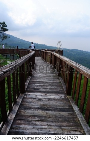 wooden bridge over the mountains, a spot to relax and take pictures