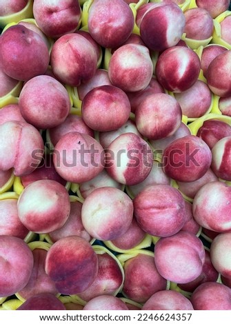 Peach fruit close-up. Texture background of sweet ripe peaches. Fruit Peaches Food Image