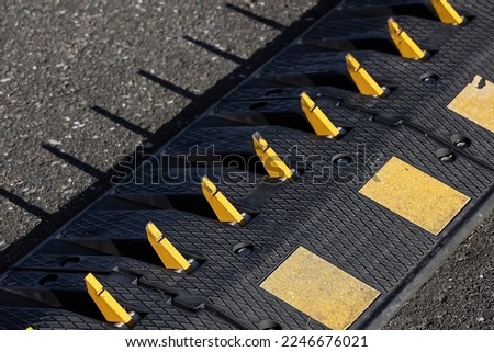 Spikes at road barrier. one way. Royalty-Free Stock Photo #2246676021