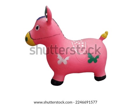 A child's toy, rubber jumping horse, on an isolated background