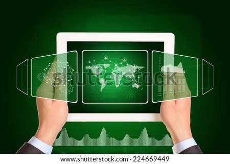 Man hands using tablet pc. Image of world map and network on tablet screen