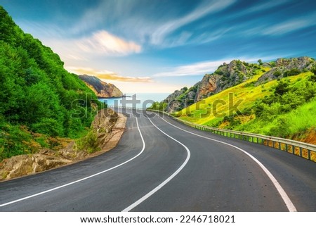 Beautiful nature scenery to travel on the colorful road landscape among the mountains by the sea. Traveling in the beach highway landscape during summer vacation. Turkey journey in green nature road. Royalty-Free Stock Photo #2246718021